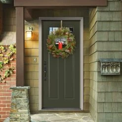 24" Feel Real® Bristle Berry Wreath With Red Electronic Candle, Red Berries & Cones -Northlight Shop D206627S 2