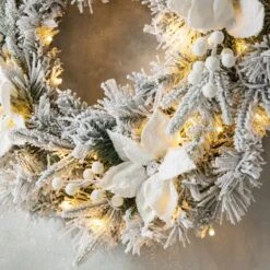 Glitzhome® 24" Pre-Lit Snow Flocked Greenery Pine Poinsettia Christmas Wreath 14 Glitzhome® 24" Pre-Lit Snow Flocked Greenery Pine Poinsettia Christmas Wreath -Northlight Shop D652255S 5